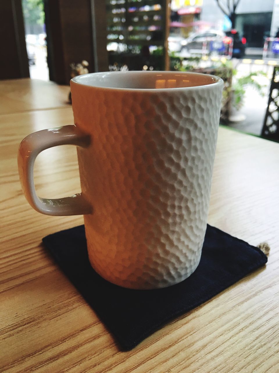 table, indoors, still life, focus on foreground, close-up, food and drink, wood - material, coffee cup, chair, drink, wooden, empty, absence, no people, coffee - drink, selective focus, refreshment, freshness, cup, cafe