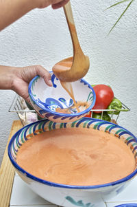 High angle view of person preparing food on table