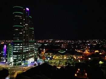 Illuminated cityscape at night