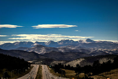 Country road leading towards mountains