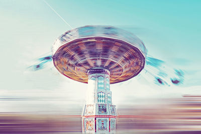 Blurred motion of chain swing ride