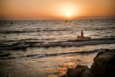 Scenic view of sea against sky during sunset