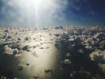 Aerial view of cloudscape against sky on sunny day