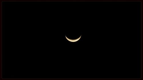 Low angle view of moon in sky