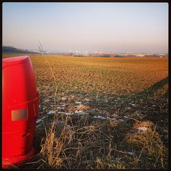 Field against sky during sunset