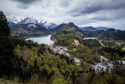 Scenic view of lake against cloudy sky