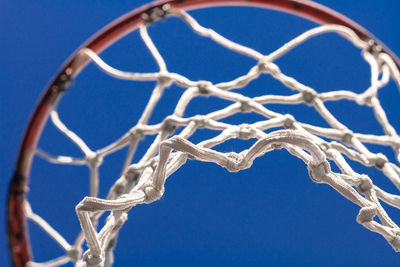 Close-up of basketball hoop against clear sky