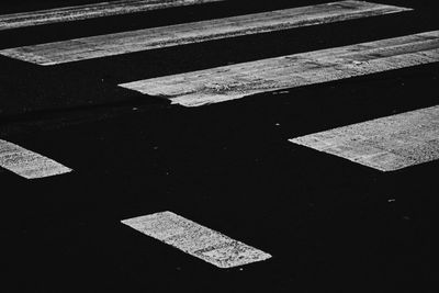 High angle view of arrow sign on road