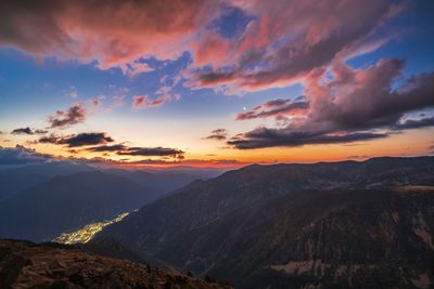 Scenic view of mountains against sky during sunset