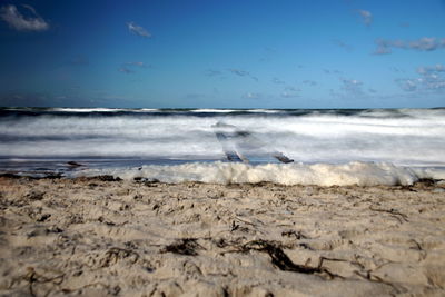 Scenic view of beach against sky