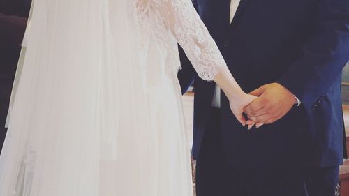 Close-up of hand holding umbrella