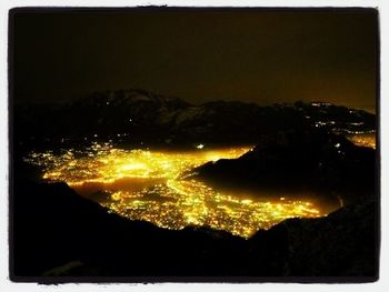 Illuminated city at night