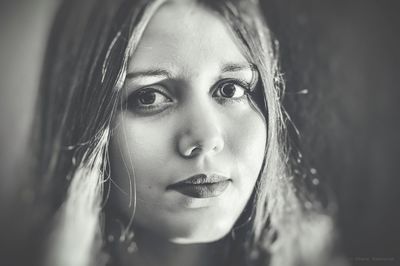 Close-up portrait of young woman