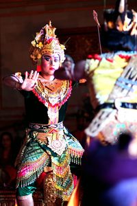 Young woman performing traditional dancing