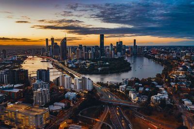 High angle view of buildings against sky during sunset