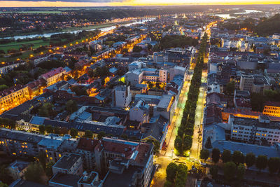 High angle view of illuminated buildings in city