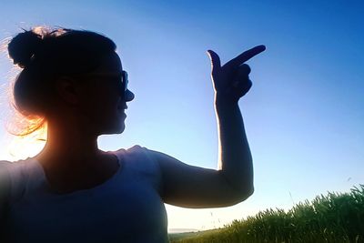 Close-up of woman against sky