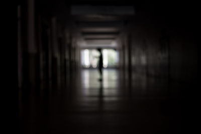 Close-up of woman in dark