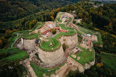 Srebrna gora fortress and sudety mountains at autumn season, aerial drone view