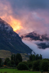 Scenic view of mountains against dramatic sky