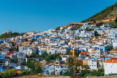 View of cityscape against clear sky