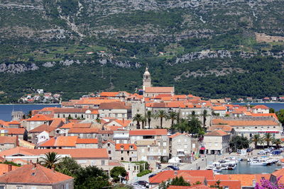 High angle view of town against mountain