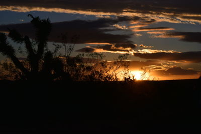 Scenic view of silhouette landscape against sky during sunset