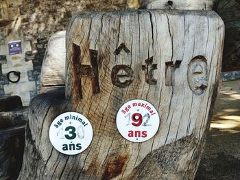 Close-up of text on wood