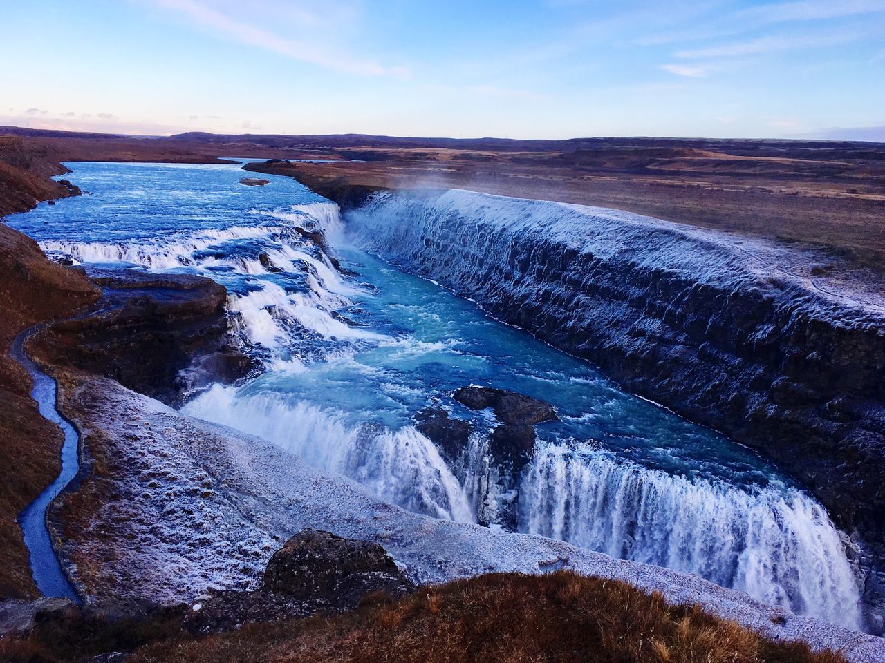 SCENIC VIEW OF WATERFALL