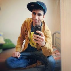 Young man using mobile phone