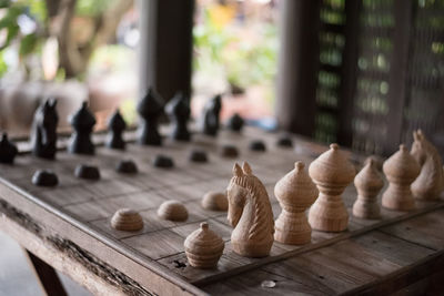 Close-up of chess pieces on chess board