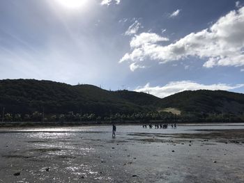 Scenic view of beach against sky