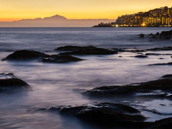 Scenic view of sea against sky during sunset