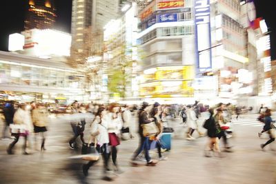 Crowd in city at night