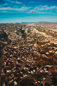 Aerial view of townscape against sky
