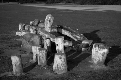 Pile of logs on wooden logs