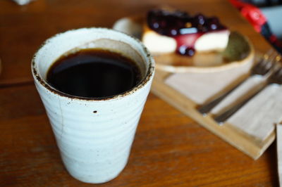 High angle view of coffee cup on table