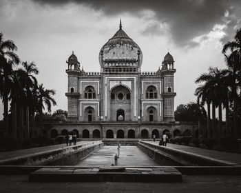 View of historical building against cloudy sky