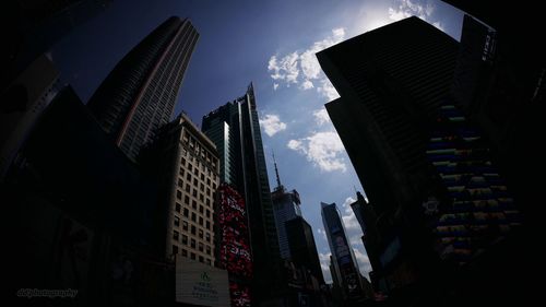 Low angle view of skyscrapers against sky