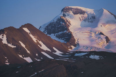 Scenic view of mountains against sky during winter