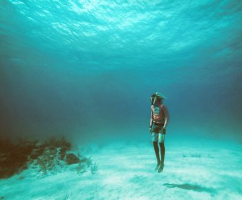 Woman swimming in sea