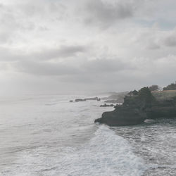 Scenic view of sea and cloudy sky