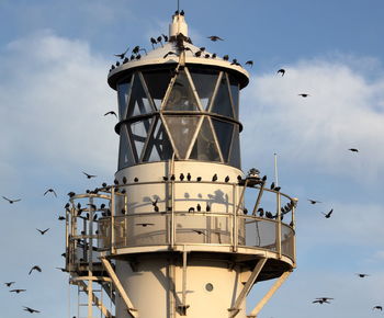 Low angle view of lighthouse against sky