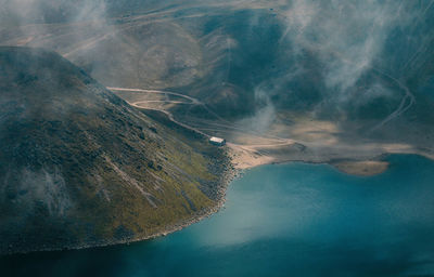 High angle view of sea and mountain