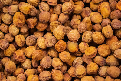 Vegan sweets - dried apricots closeup in the store.