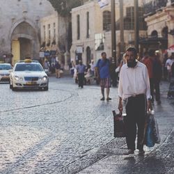 People walking on city street