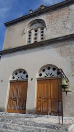 Low angle view of old building against sky