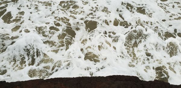 Full frame shot of rocks on beach