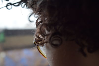 Close-up midsection of young woman wearing eyeglasses