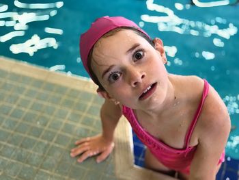 Portrait of man swimming in pool